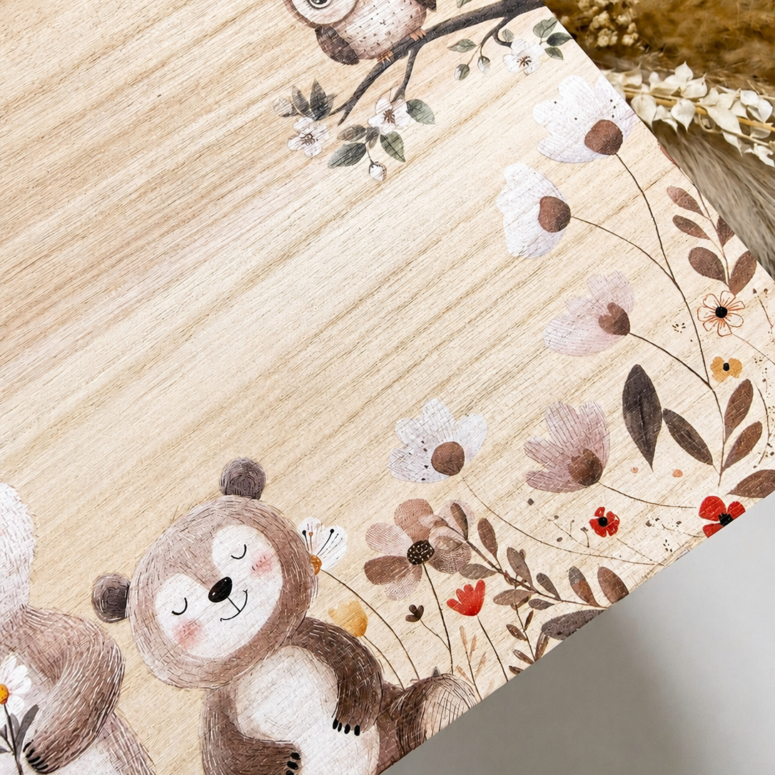 Wooden surface with decorative elements including owls and flowers.